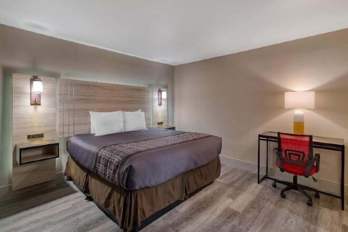 Desk, laptop workspace, free WiFi, bed sheets