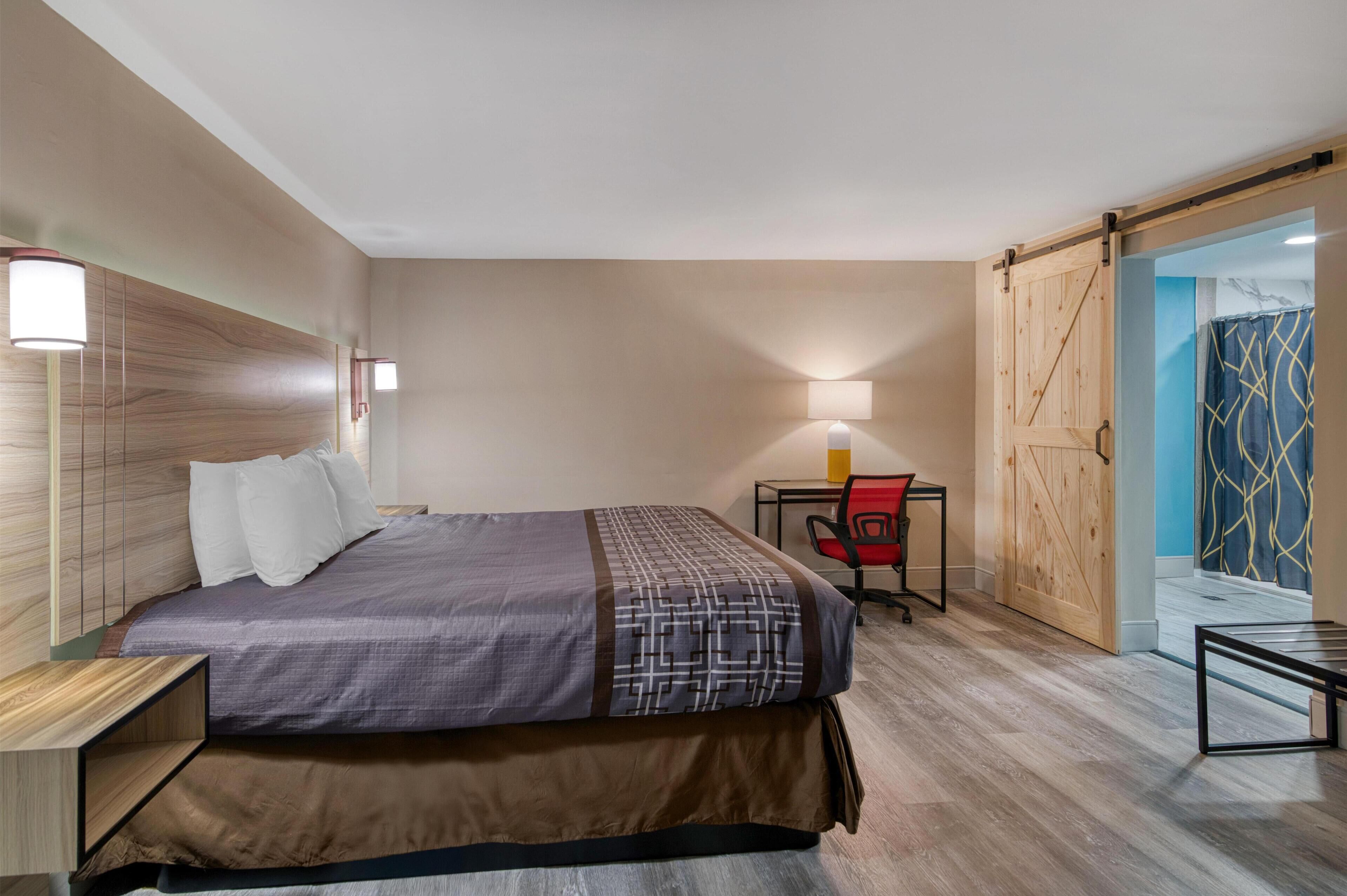 Desk, laptop workspace, free WiFi, bed sheets