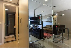 Apartment | Living area | 49-inch flat-screen TV with cable channels, TV