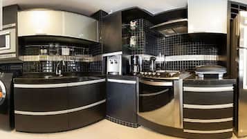 Apartment | Private kitchen | Fridge, microwave, stovetop, blender