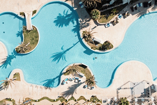 Indoor pool, outdoor pool, pool umbrellas, sun loungers