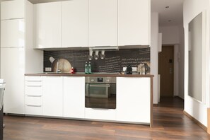 Apartment, 1 Bedroom (Chmielna 122) | Private kitchenette | Full-size fridge, oven, stovetop, dishwasher - Apartament Chmielna by Your Freedom (Warsaw)