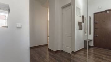 Comfort Apartment, 2 Bedrooms, Kitchenette (Zelazna 16) | Iron/ironing board, free WiFi, bed sheets