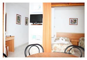 Apartment, 2 Bedrooms | Down comforters, iron/ironing board, cribs/infant beds, bed sheets - Apartamentos del Rey (Sant Joan de Labritja)