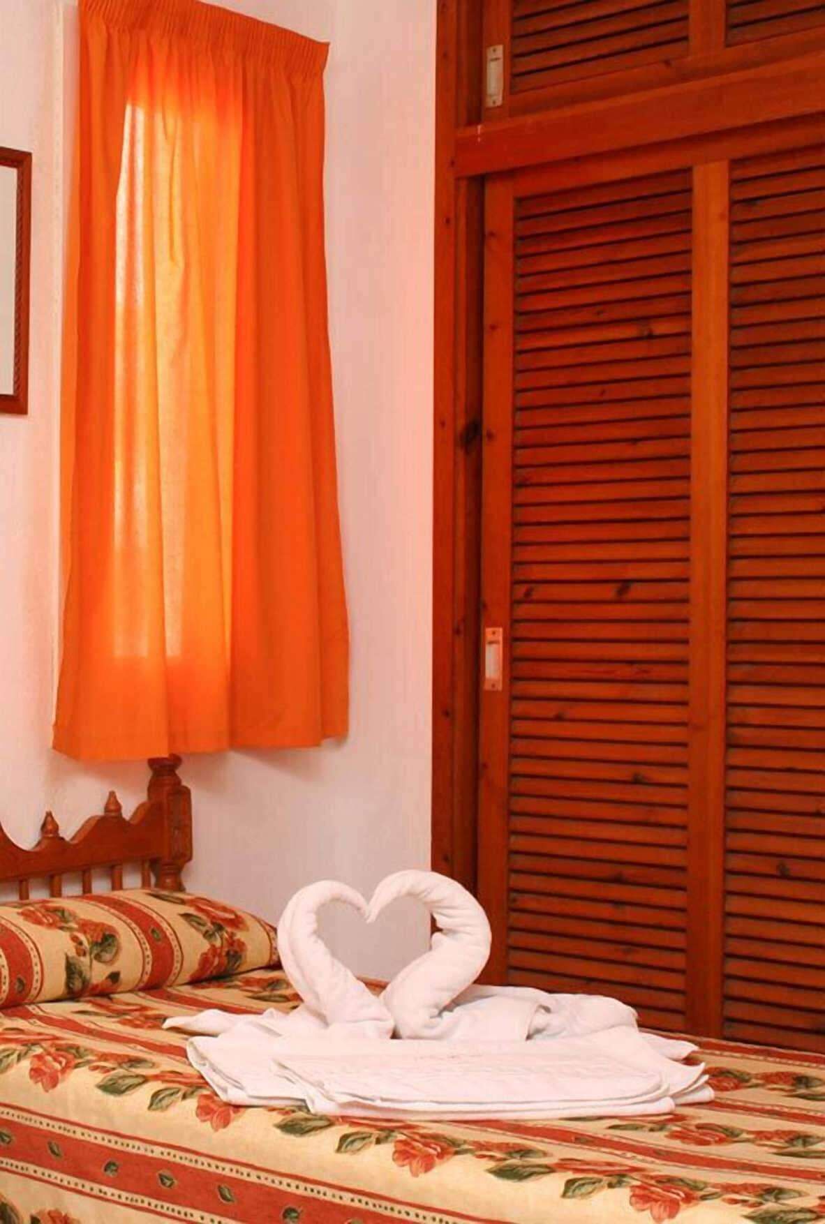 Down comforters, iron/ironing board, cribs/infant beds, bed sheets