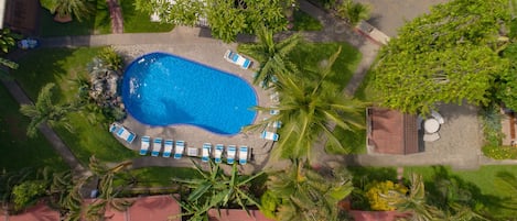 Outdoor pool, open 7:00 AM to 10:00 PM, sun loungers