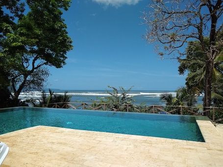 Outdoor pool, open 8:00 AM to 10:00 PM, pool loungers