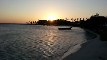 On the beach, white sand, beach towels