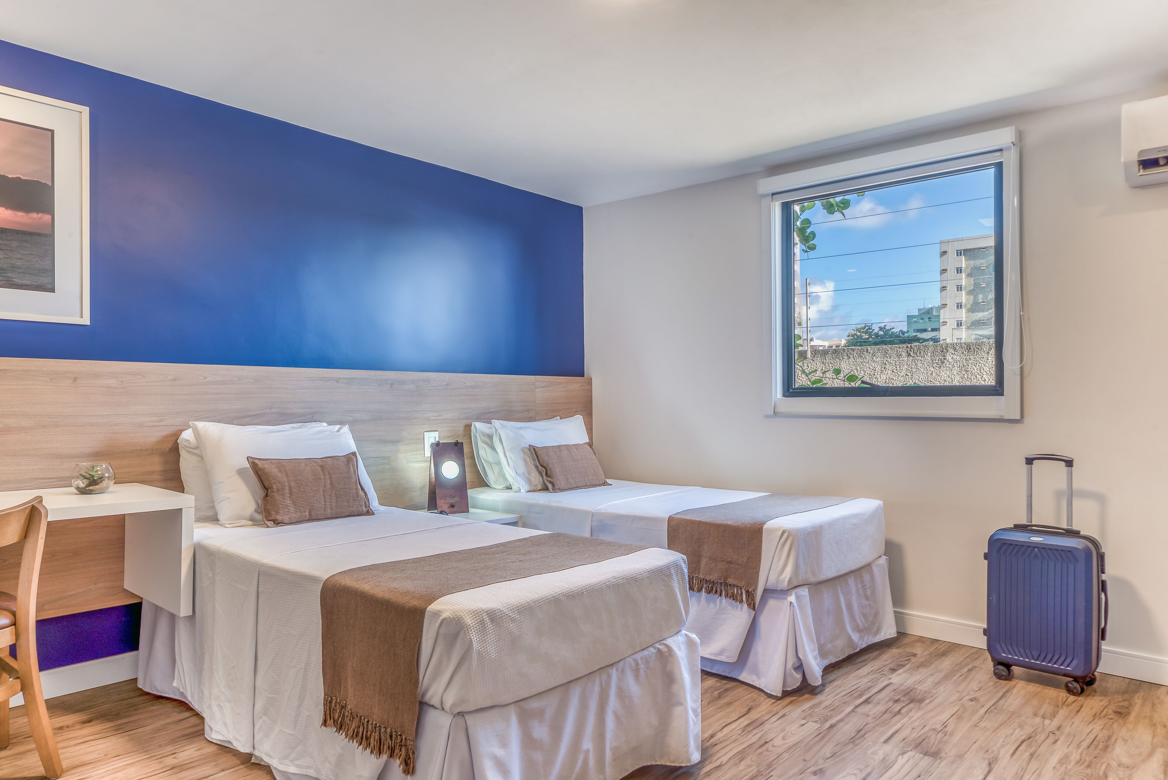 laptop workspace, blackout curtains, free wifi, bed sheets