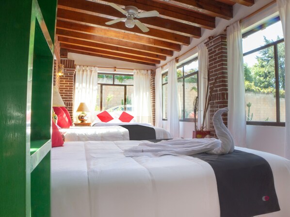 Family Room, Multiple Beds | Desk, free WiFi, bed sheets, wheelchair access - Valle Dorado (Valle de Bravo)