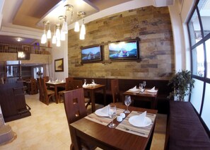 Standard Triple Room | Restaurant | Breakfast, lunch, dinner served; Regional cuisine
