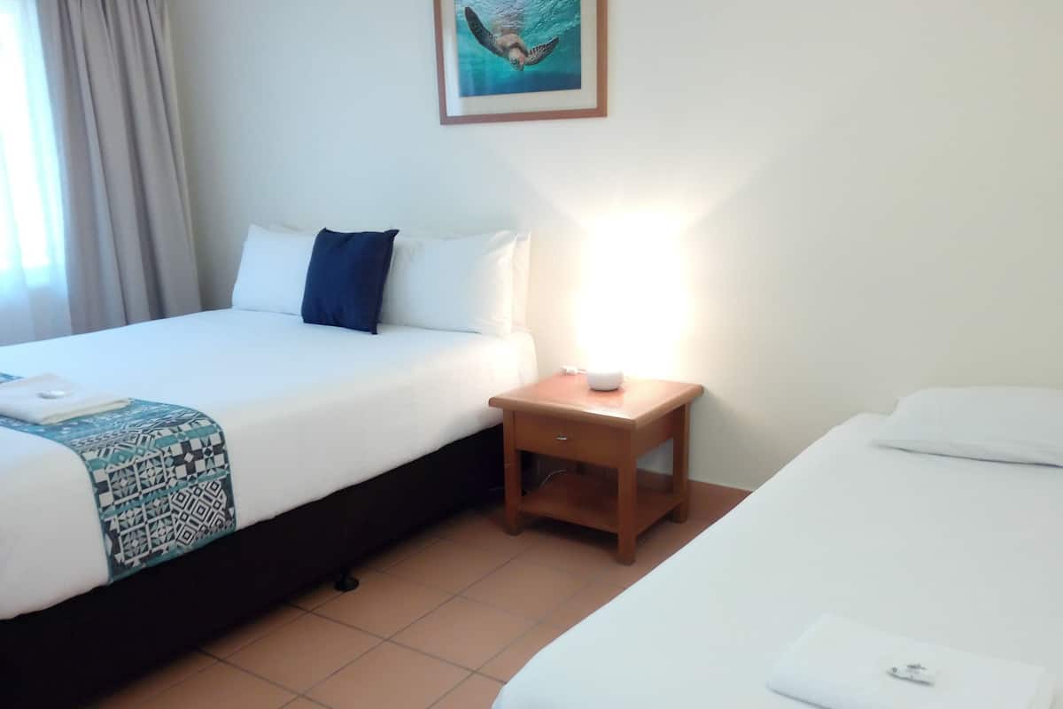 Apartamento, 2 quartos | 1 quarto, cortinas blackout, roupa de cama