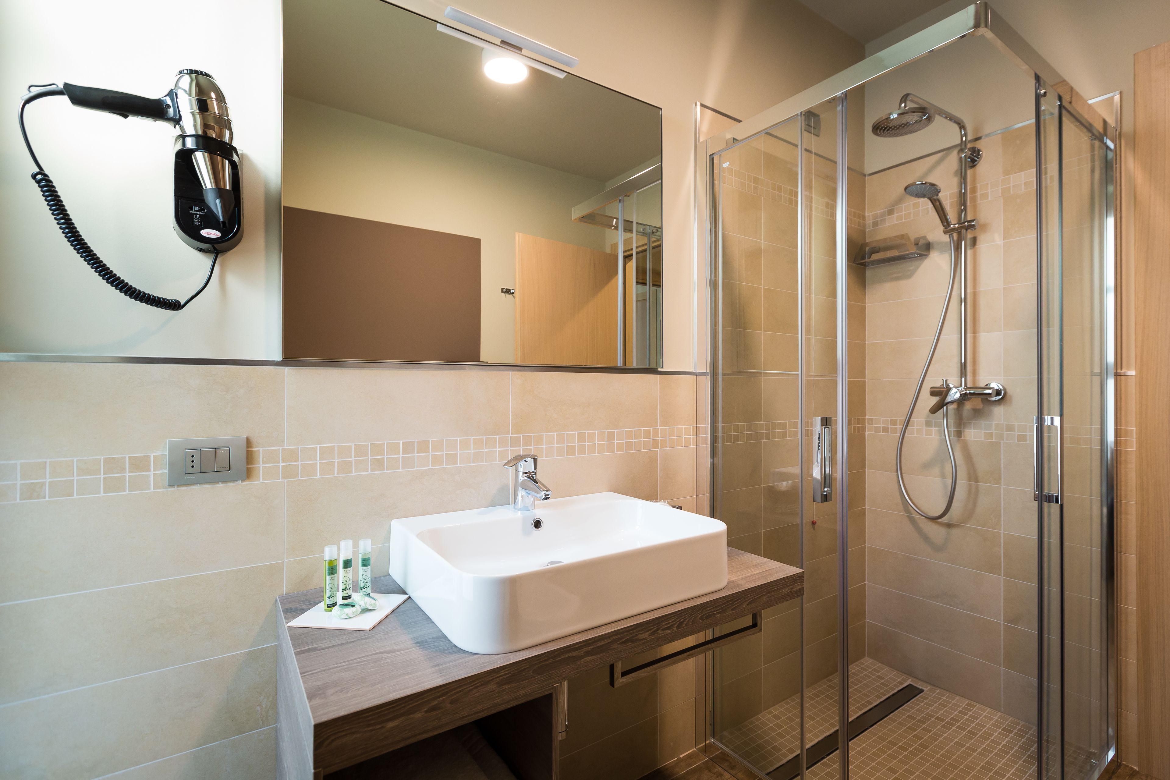 junior triple room | bathroom | shower, free toiletries, hair dryer, slippers