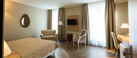 Junior Triple Room | 1 bedroom, minibar, in-room safe, desk