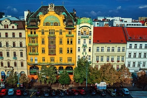 A historic building with a green roof, labeled "Grand Hotel Europa," featuring ornate architecture and multiple balconies. - Hotel Meran (Prague)
