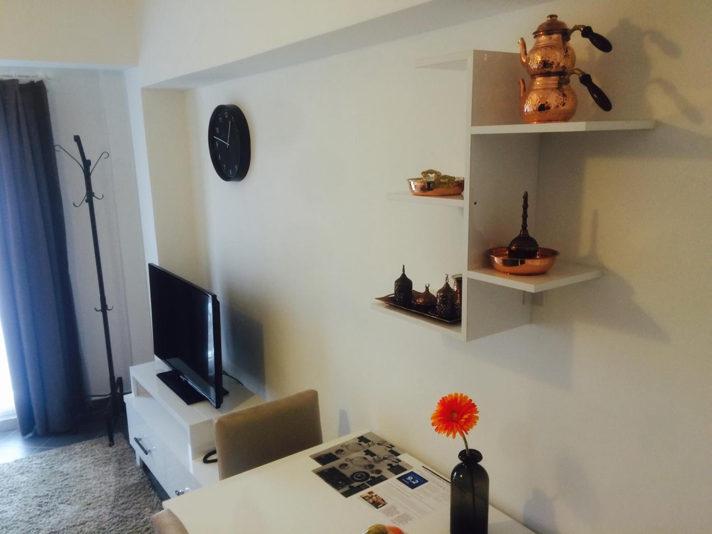 one bedroom suite with kitchen with old town view | living room | 43-inch led tv with satellite channels, tv