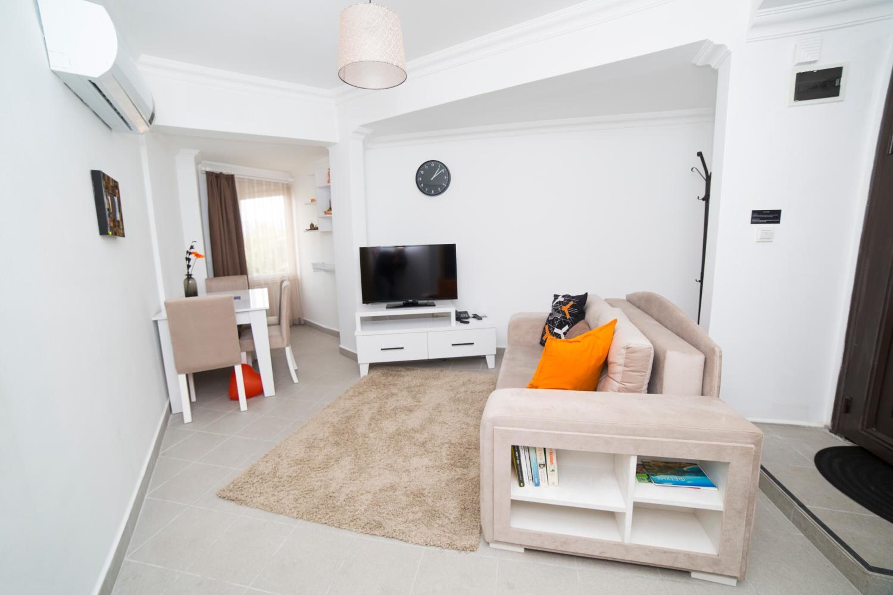 one bedroom suite with kitchen with old town view | living room | 43-inch led tv with satellite channels, tv