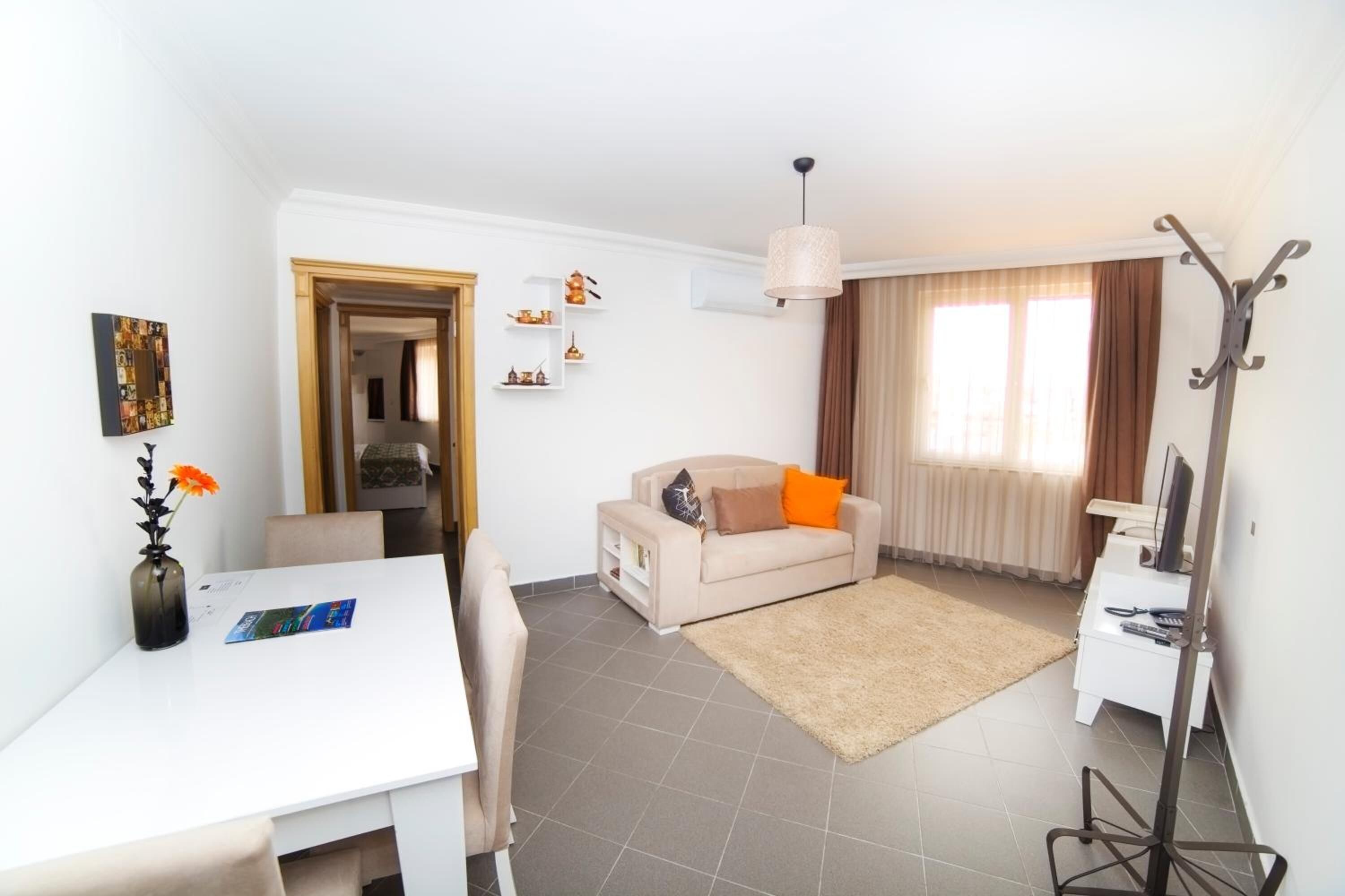 one bedroom suite with kitchen with old town view | living room | 43-inch led tv with satellite channels, tv