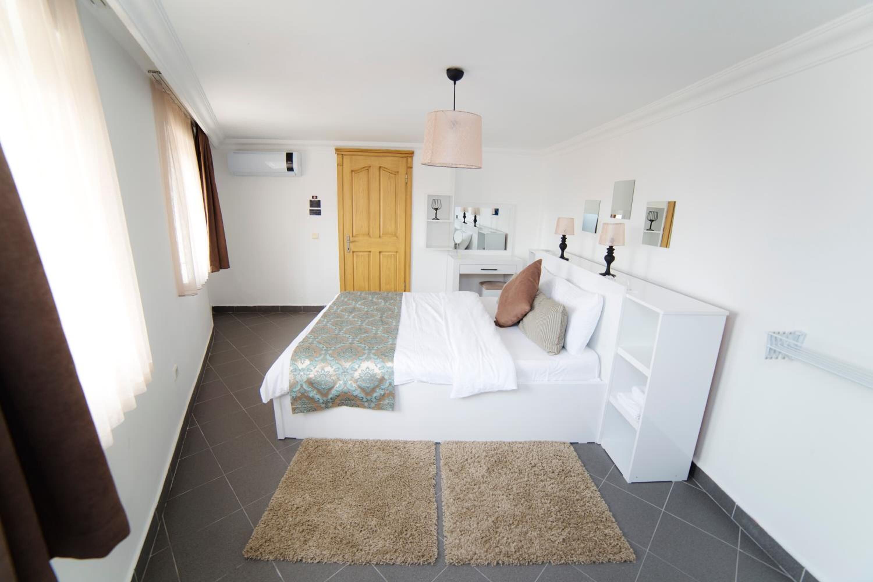 one bedroom suite with kitchen with old town view | premium bedding, laptop workspace, soundproofing, iron/ironing board