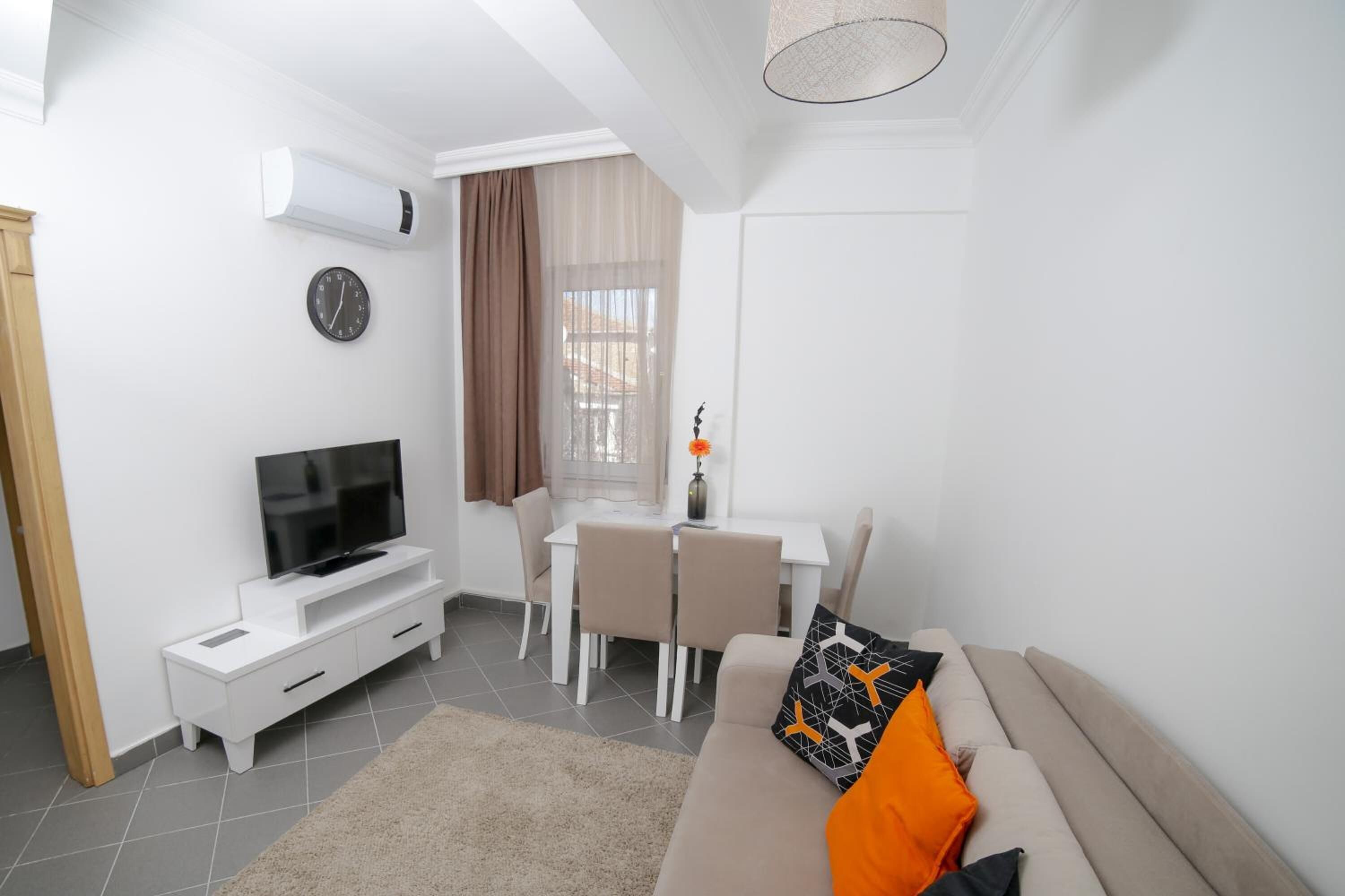 one bedroom suite with kitchen with old town view | living room | 43-inch led tv with satellite channels, tv