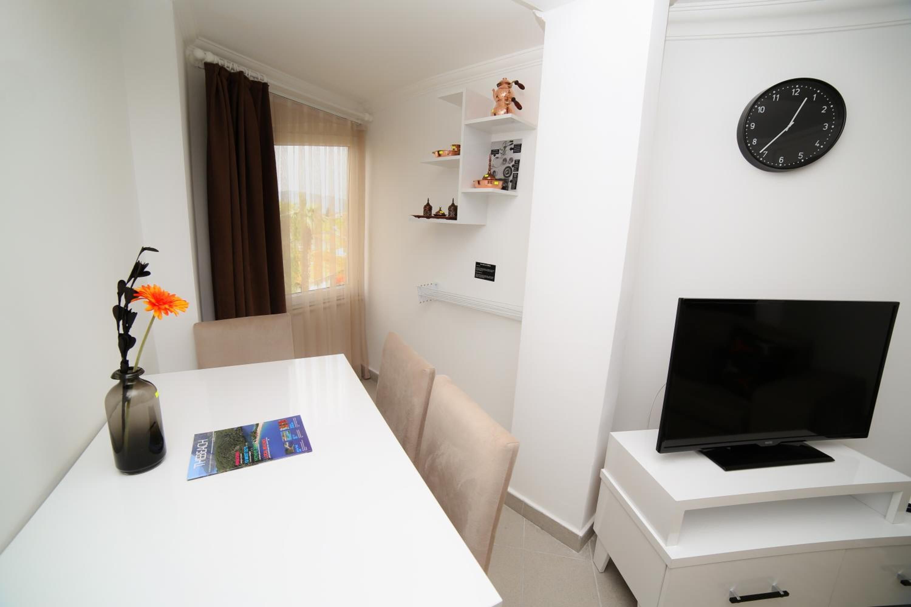 one bedroom suite with kitchen with old town view | living room | 43-inch led tv with satellite channels, tv
