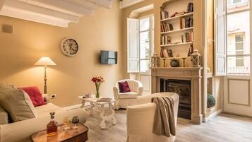 Suite Confort, 1 chambre, balcon | Coin séjour