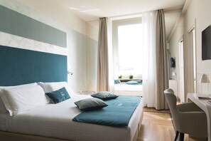 Premium bedding, down comforters, memory foam beds, minibar