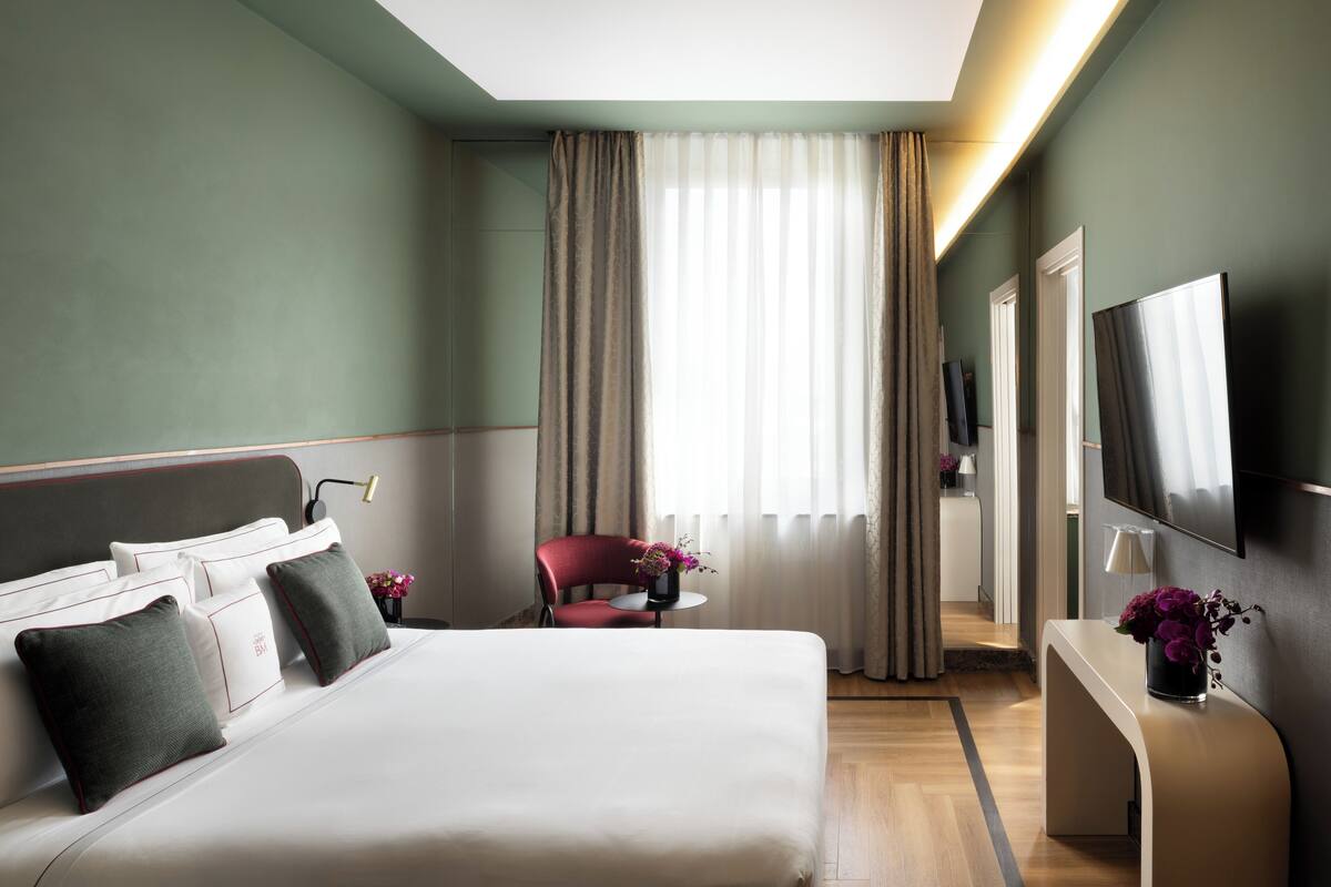 Junior suite, meerdere bedden | Luxe beddengoed, donzen dekbedden, bedden met traagschuimmatras