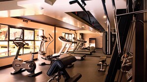 A gym with treadmills, elliptical machines, and weight equipment. - DoubleTree by Hilton Nairobi Hurlingham (Nairobi)