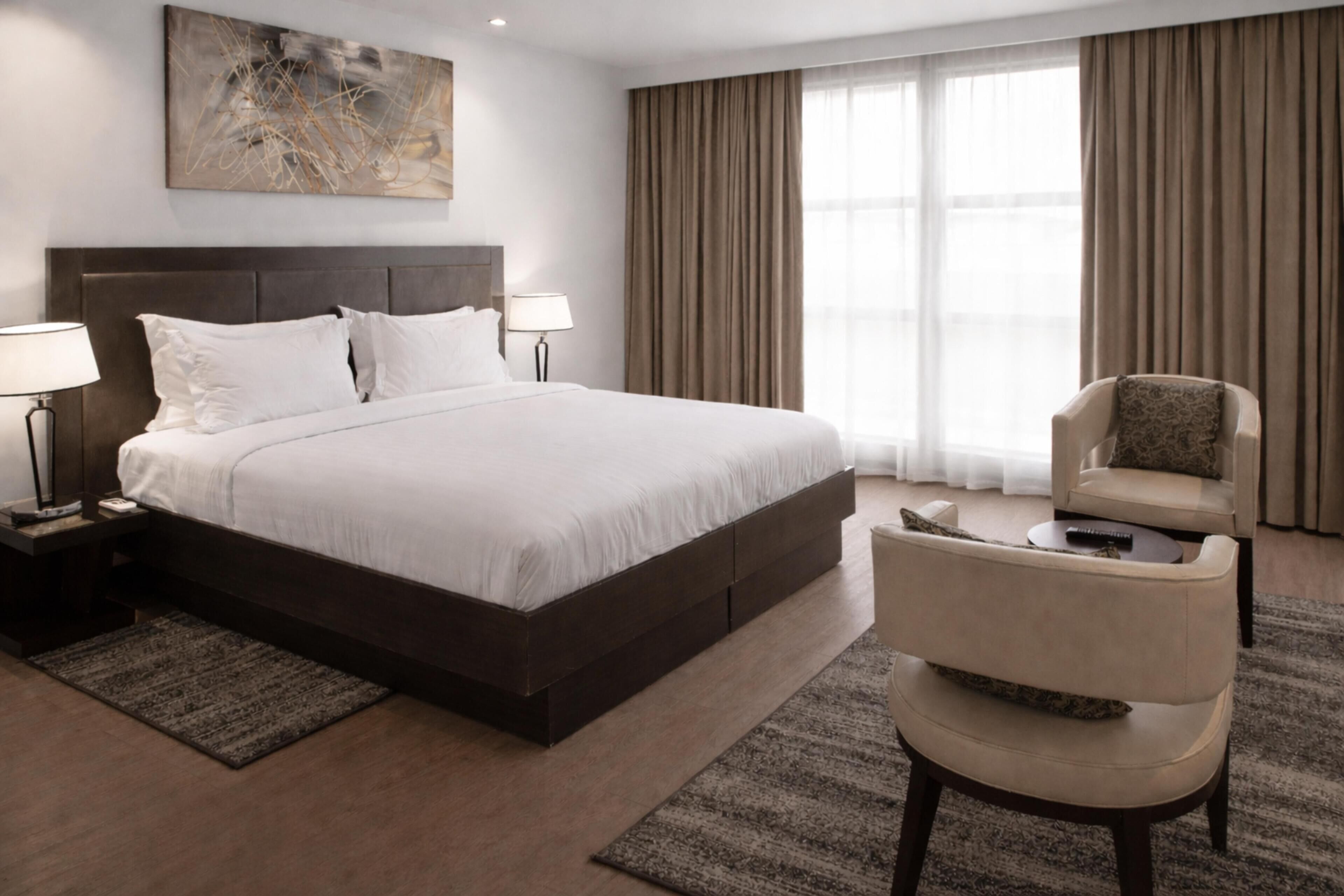 Hypo-allergenic bedding, in-room safe, desk, laptop workspace