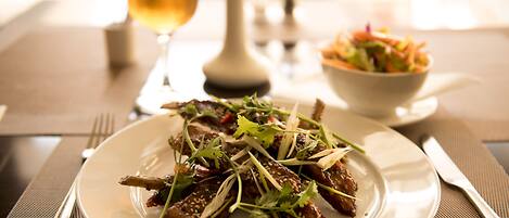 Breakfast, lunch, dinner served; international cuisine