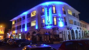 A multi-story hotel with a prominent 'K' sign and 'Kapas' written on the facade. - Ayvalik Palas Hotel (Ayvalik)
