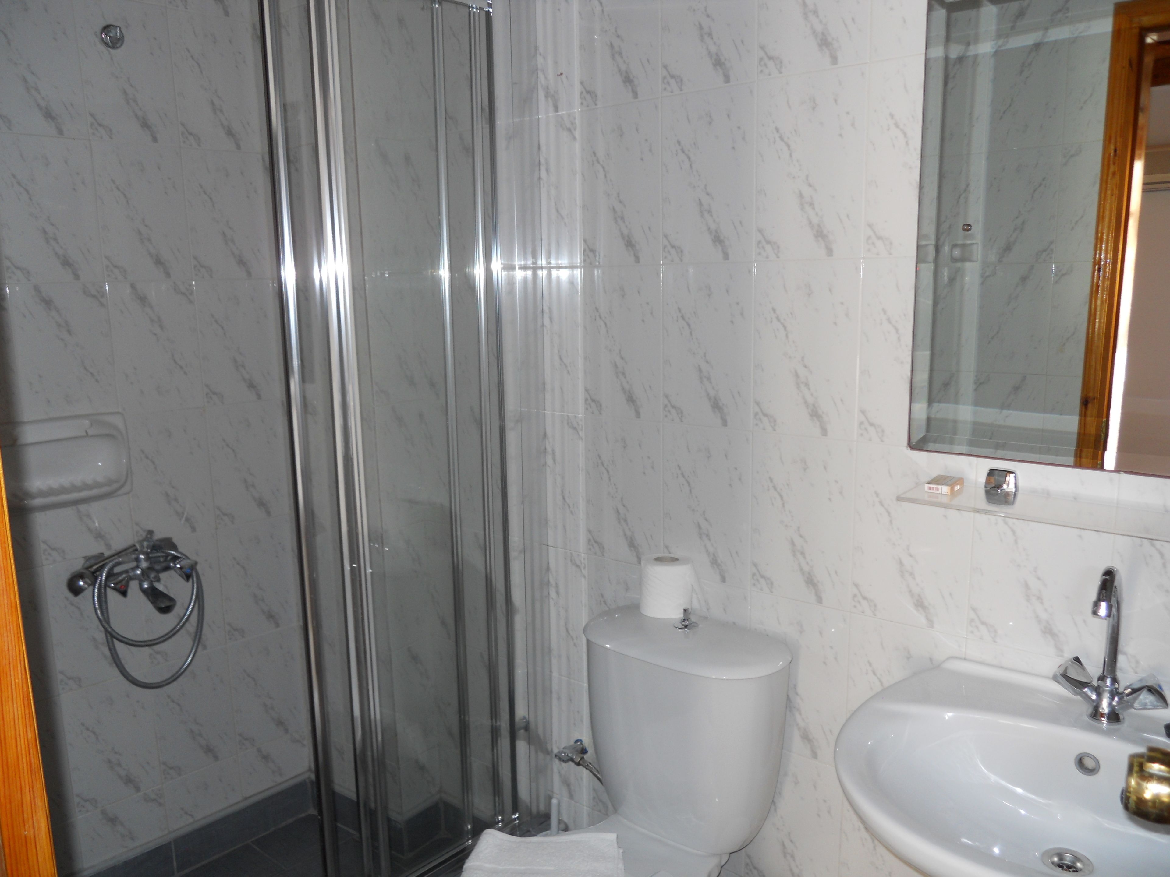 double room, sea view | bathroom | shower, free toiletries, hair dryer, slippers