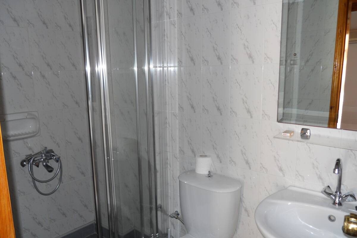 double room, sea view | bathroom | shower, free toiletries, hair dryer, slippers