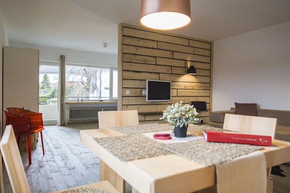 Apartment, 1 Bedroom | Living area | 81-cm flat-screen TV with cable channels, TV
