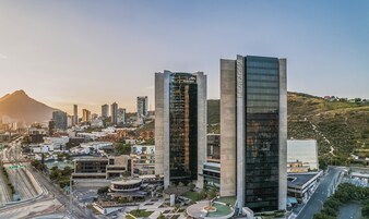 A modern urban area with two prominent buildings, one labeled "Live Aqua."