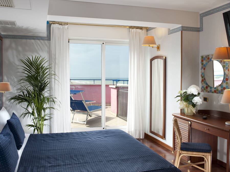 Deluxe Suite, Terrace, Sea View | In-room safe, desk, soundproofing, free WiFi