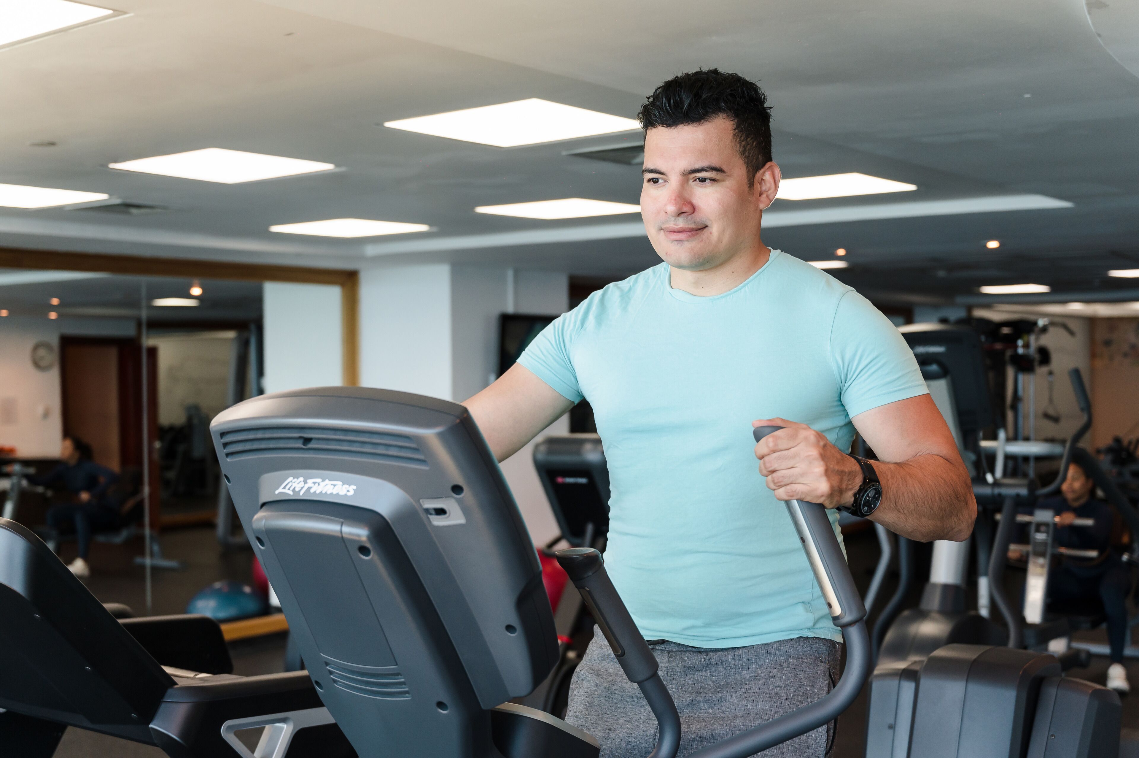 A gym with treadmills and exercise equipment.