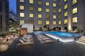 2 outdoor pools, pool umbrellas, pool loungers