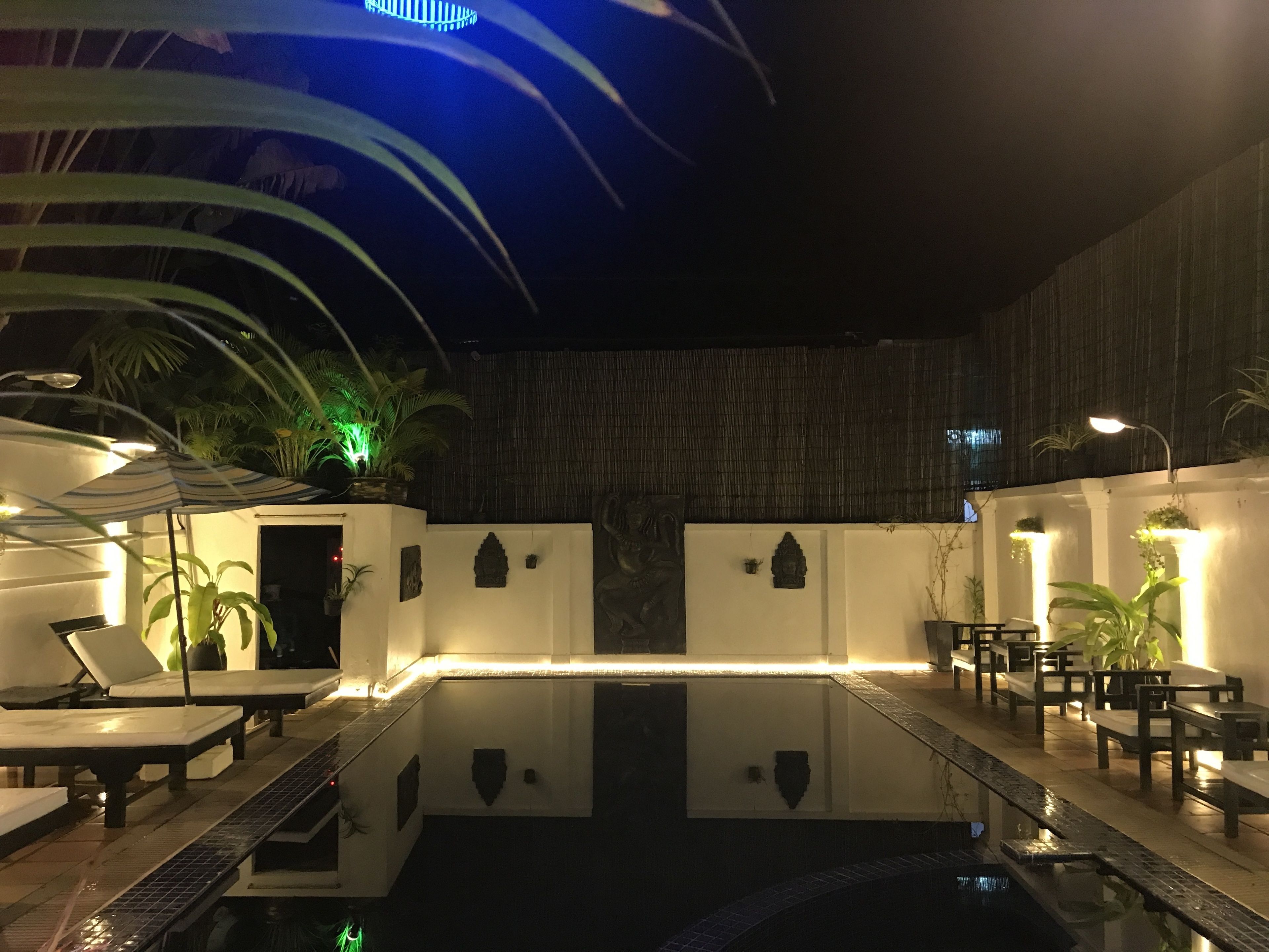 outdoor pool, pool umbrellas, pool loungers