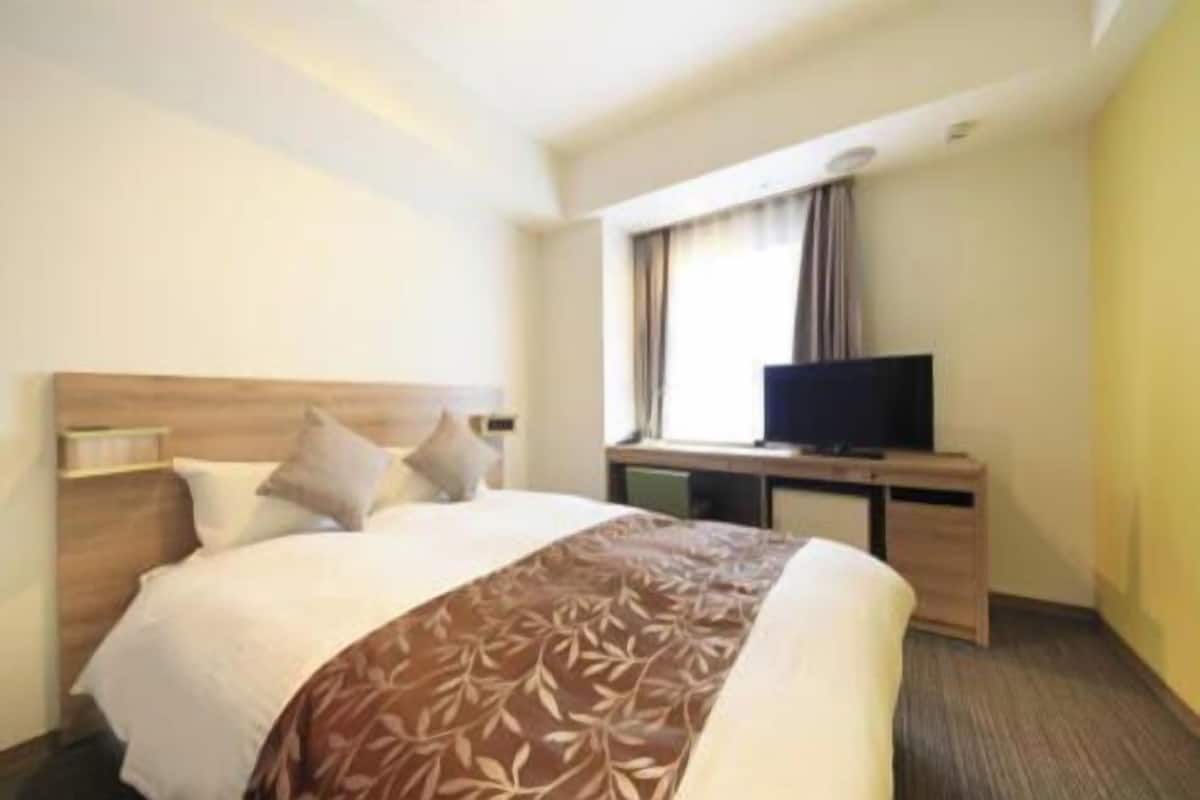 Desk, blackout curtains, iron/ironing board (on request), free WiFi