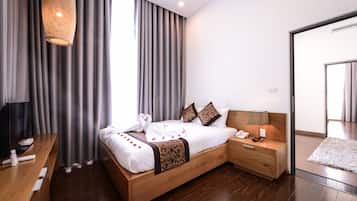 Chambre Familiale | 1 chambre, minibar, coffres-forts dans les chambres, bureau