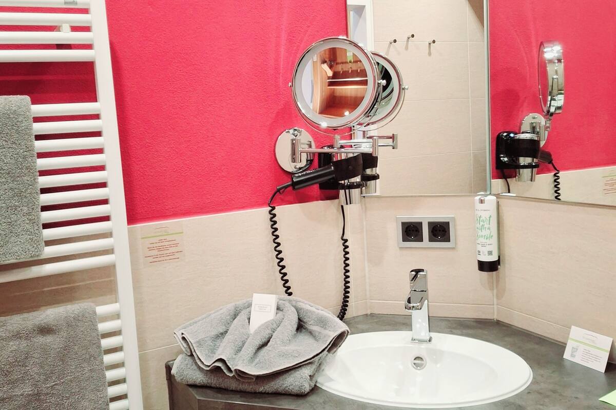 shower, free toiletries, hair dryer, towels