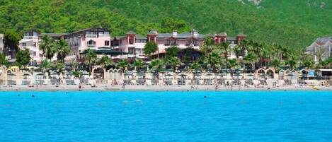 Private beach, sun loungers, beach umbrellas, beach bar