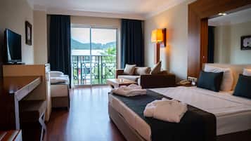 Standard Room, Pool View | Free minibar items, in-room safe, desk, soundproofing