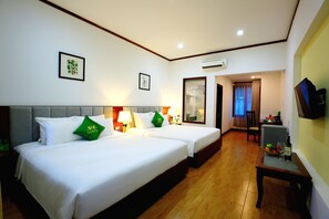 Standard Triple Room, Garden View | Minibar, desk, free WiFi, bed sheets - Santa Garden Resort (Phu Quoc)