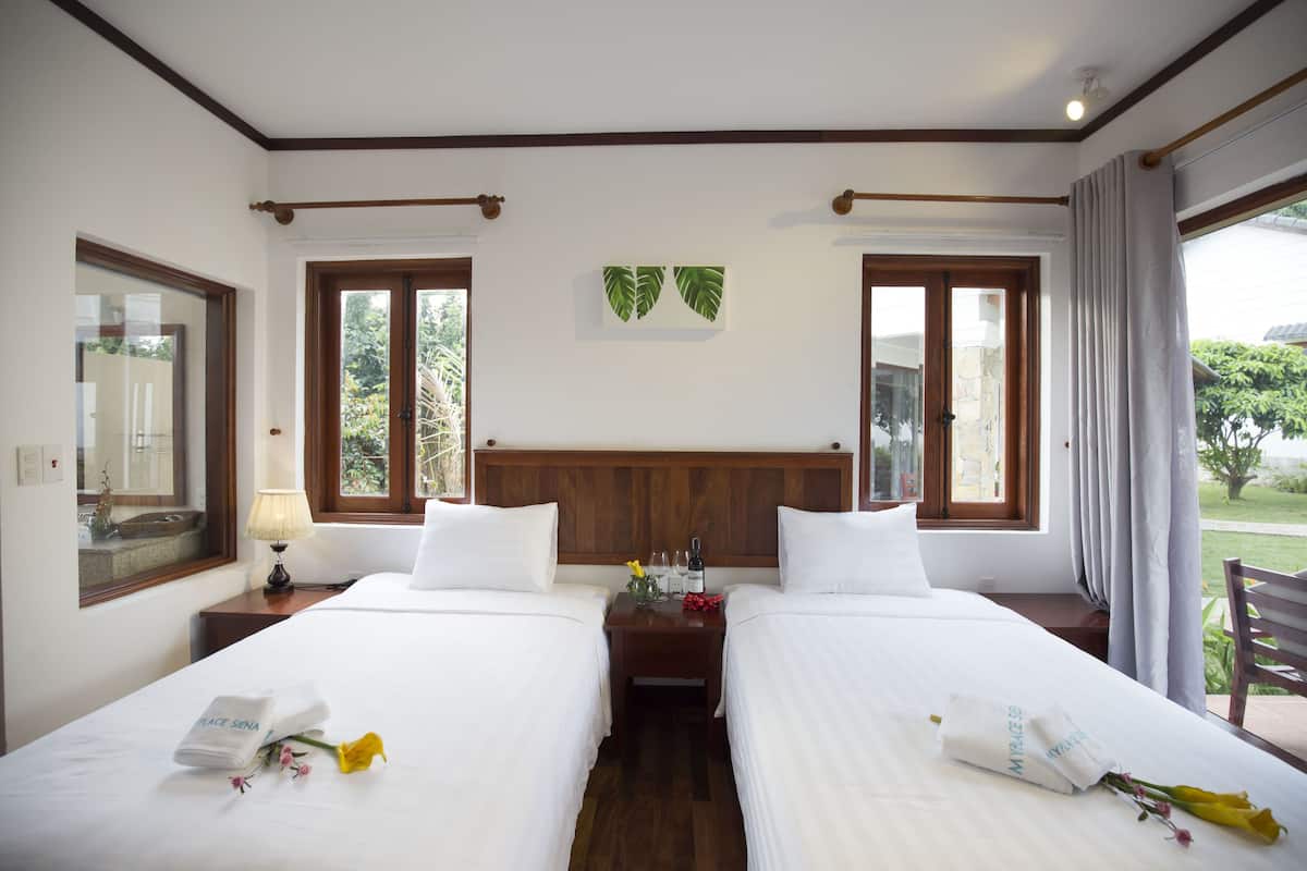 premium room, pool view | 1 bedroom, minibar, desk, free wifi