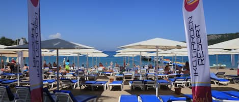 Free beach shuttle, sun-loungers, beach umbrellas