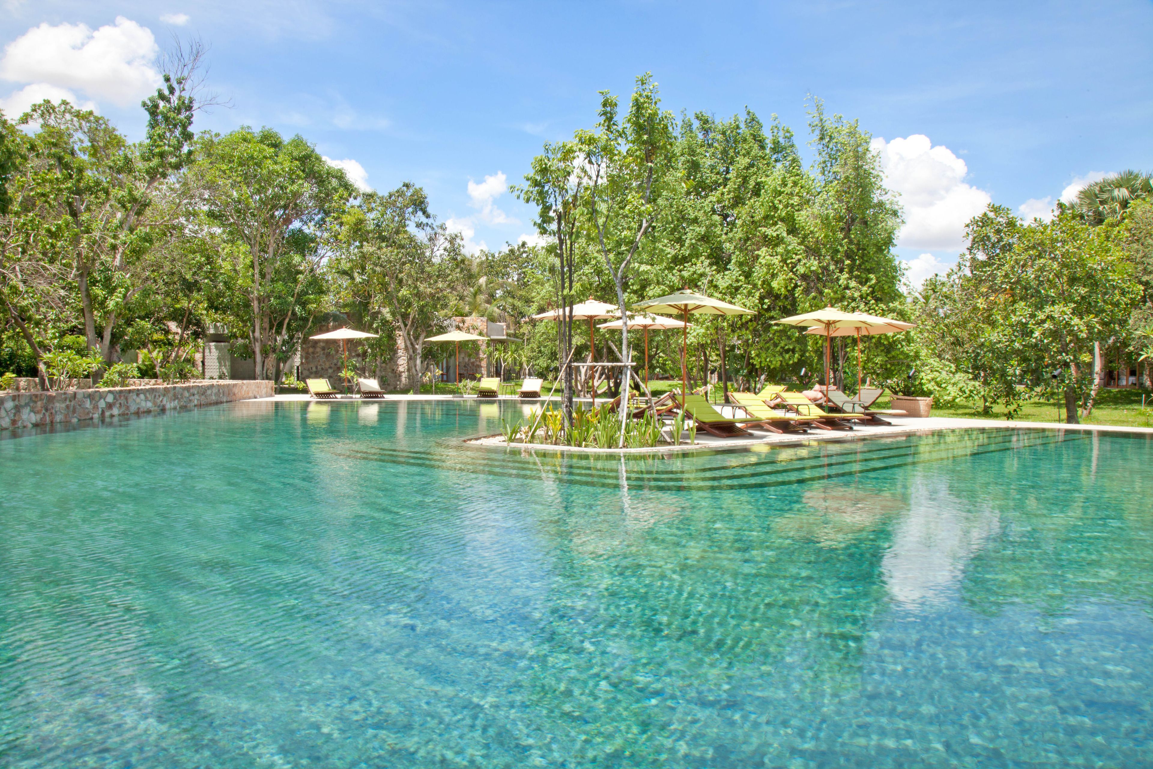 Outdoor pool, open 7:00 AM to 9:00 PM, pool umbrellas, sun loungers