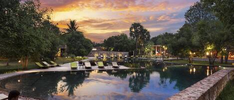 Outdoor pool, open 7:00 AM to 9:00 PM, pool umbrellas, sun loungers